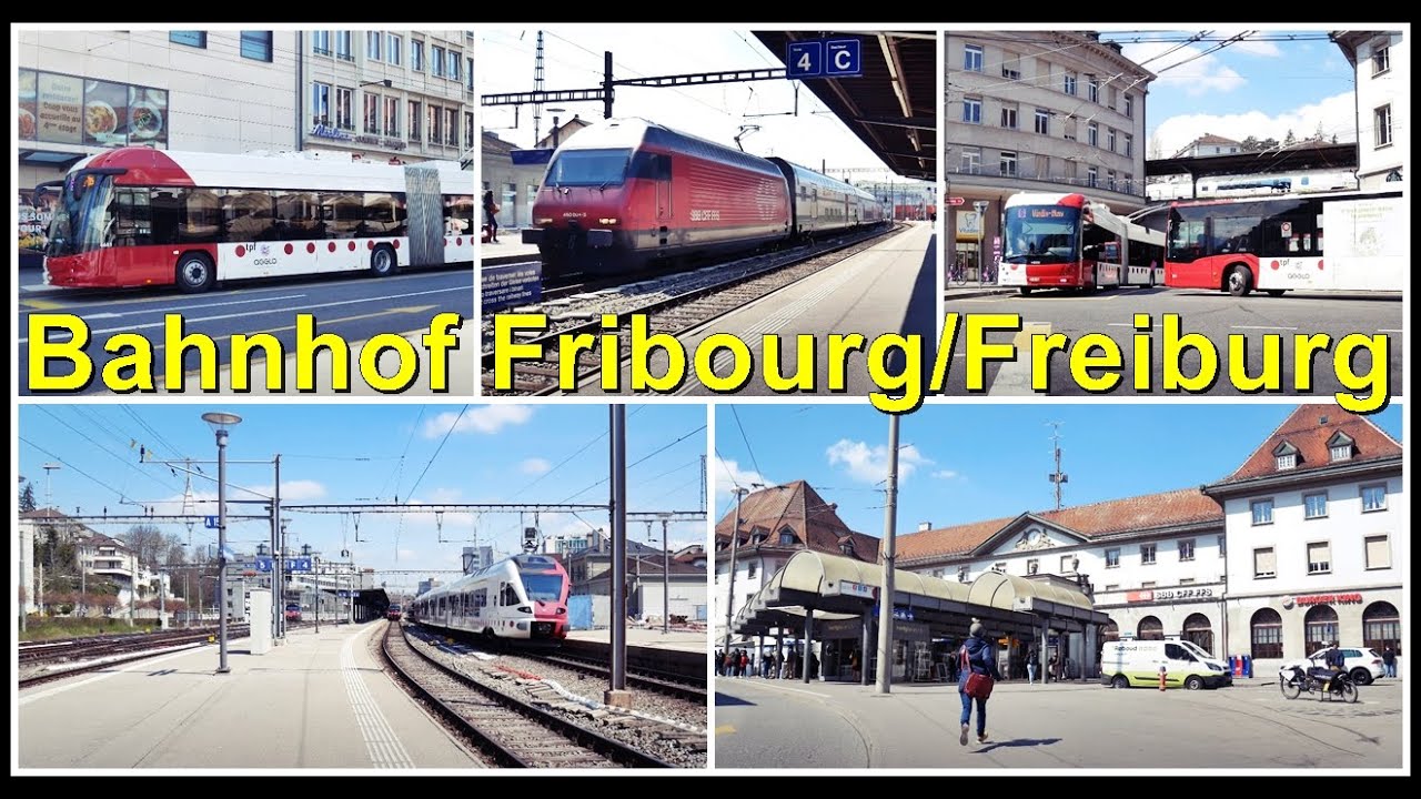 Züge und Busse beim Bahnhof Fribourg/Freiburg, Kanton Freiburg, Schweiz 2021