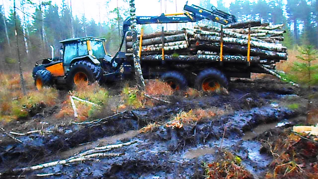 Valtra forestry tractor  stuck in mud, difficult conditions