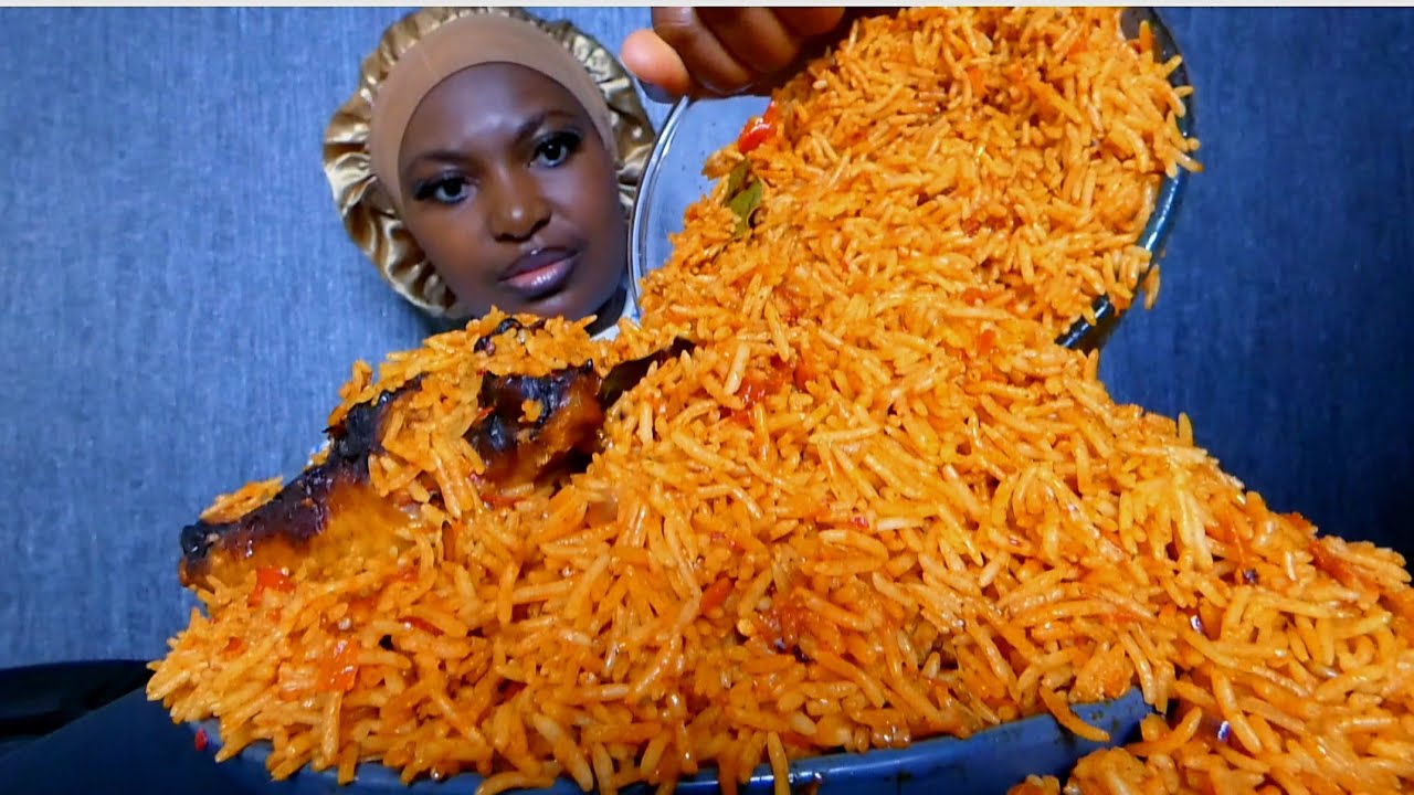 Nigerian smoky spicy jollof rice with turkey wing mukbang