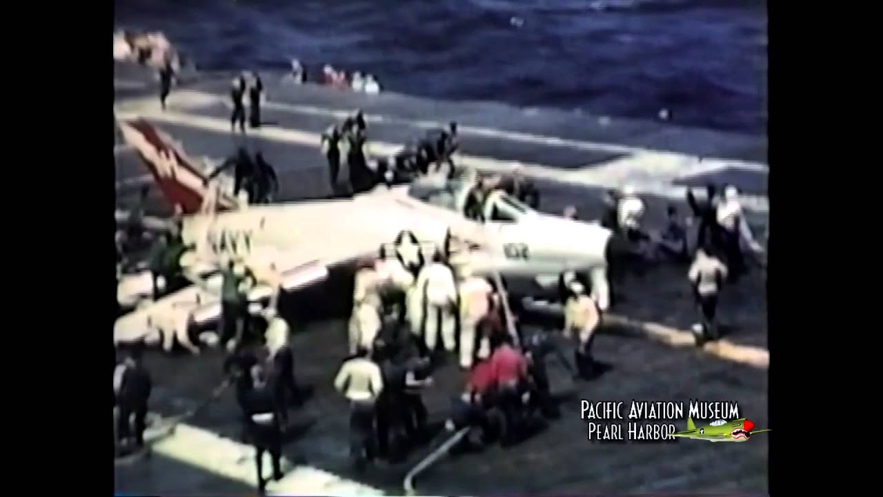 CV-38 USS Shangri-La Deck Crew Raises Crash Barrier F11F Grumman Tiger