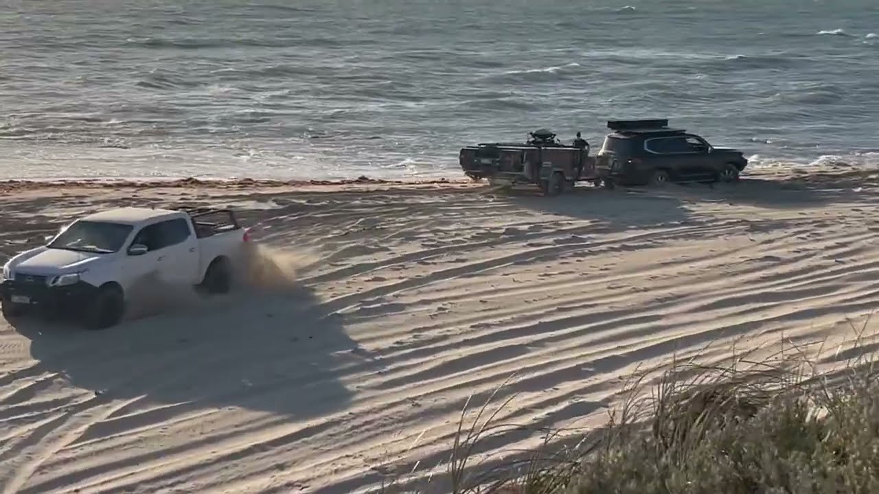 300 LANDCRUISER WITH CAMPER TRAILER BOGGED