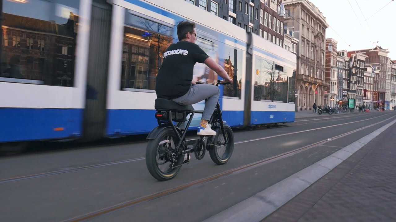 Riding through Amsterdam with the KNAAP Bike!