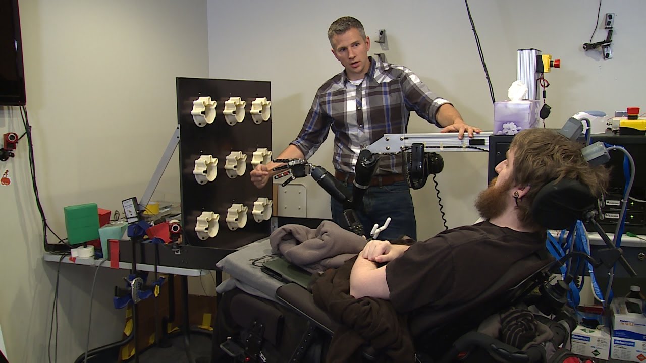 Touched by Science: Paralyzed Man Feels Again Through Mind-Controlled Robotic Arm