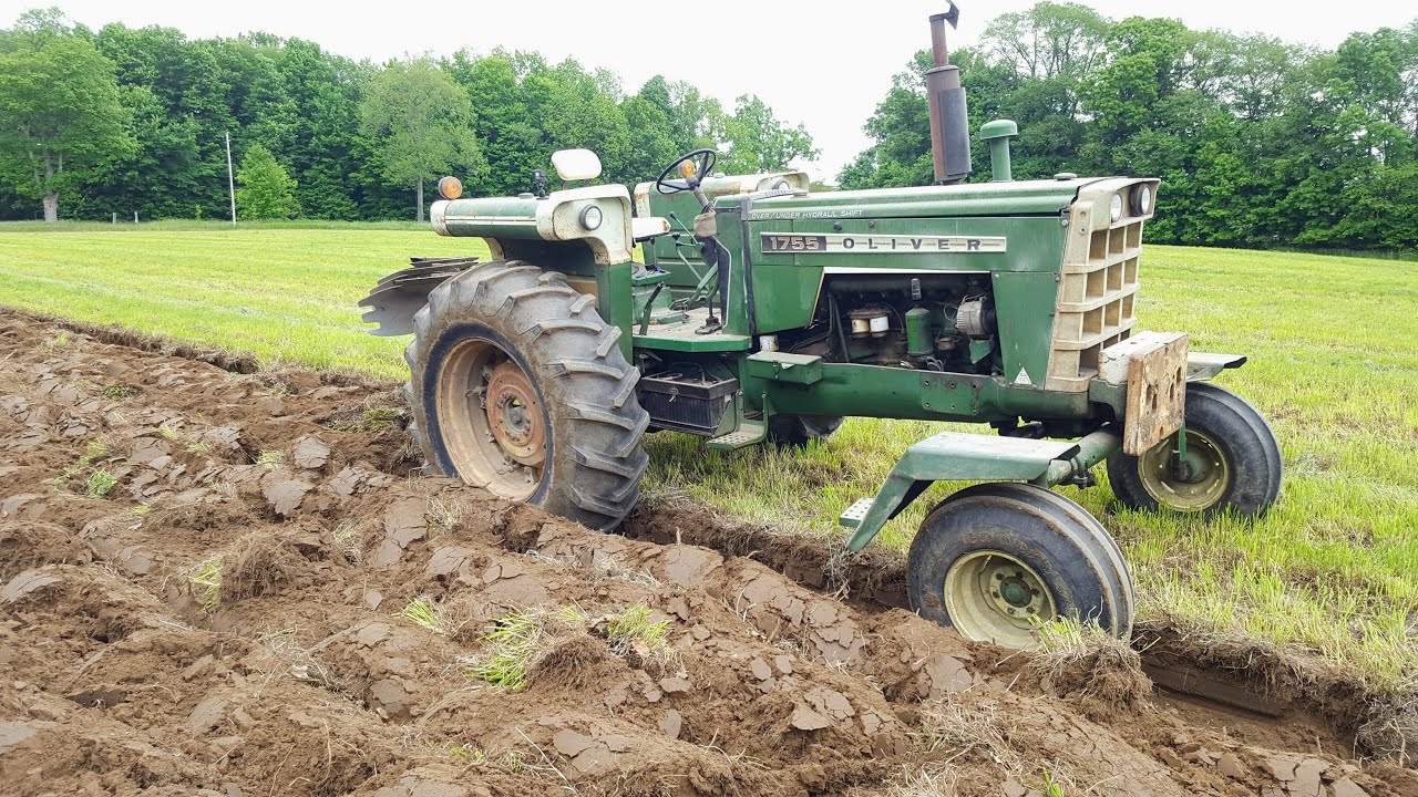Oliver 1755 Plowing with 6241 roll over plow