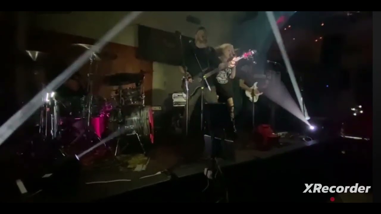 Backstage band playing cover song Wasted Years of Iron Maiden. 