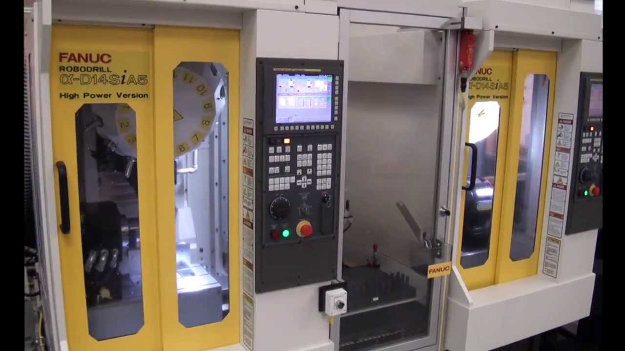 Bottle Opener Machining with Dual FANUC ROBODRILLs & FANUC LR Mate 200iD Robot
