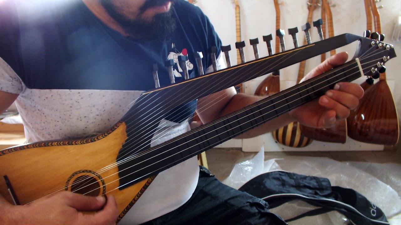CURABAB MUSICAL INSTRUMENT LUTE WITH SYMPATHETIC STRINGS AND BAG