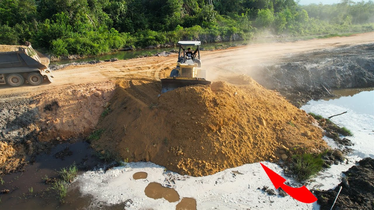 Most incredible land reclamation project processing bulldozer pushing soil leveling land