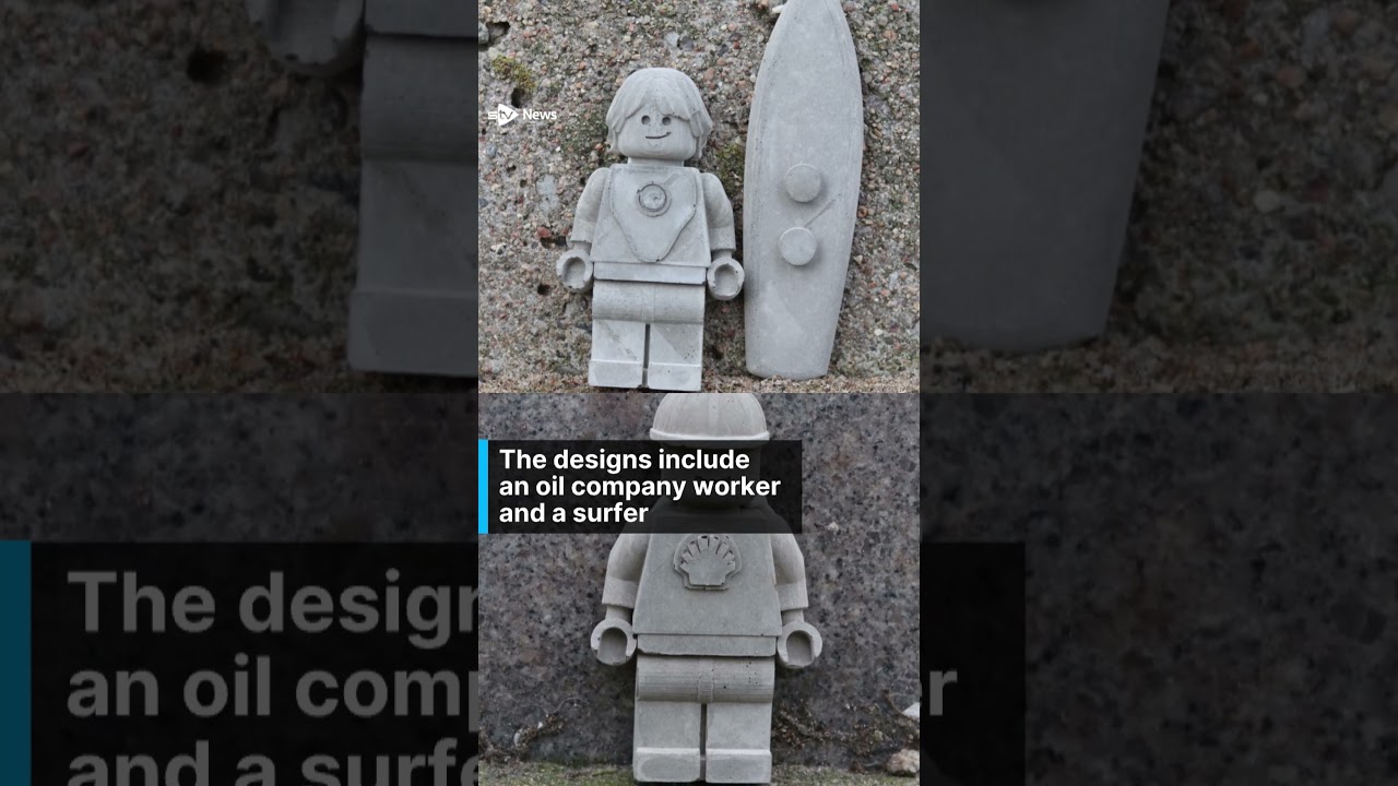 Why are concrete 'Lego figures' appearing around the city?
