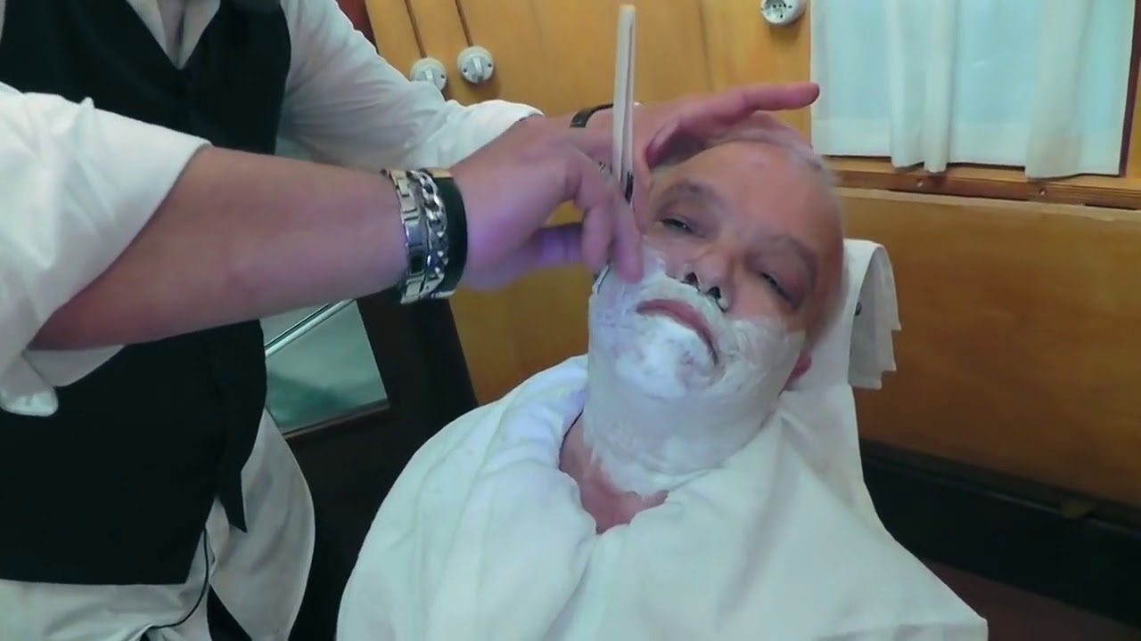 Rasoio a mano libera, Migni  Luigi fa la barba a mastro Livi
