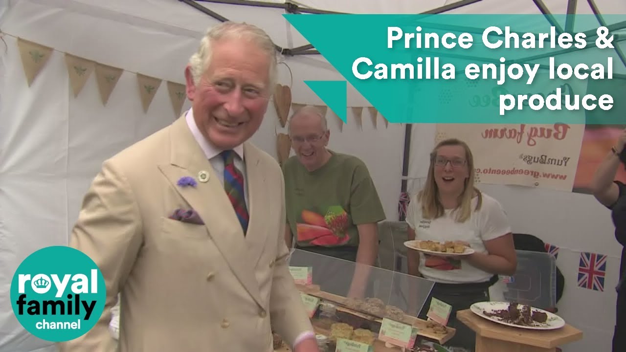 Prince Charles and Camilla enjoy local produce at Honiton market
