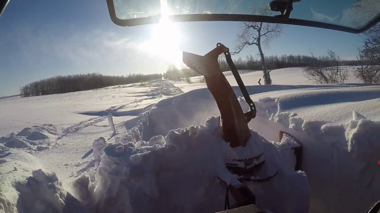 Hardcore snow blowing 6 foot deep snow drifts with the massey ferguson 4609