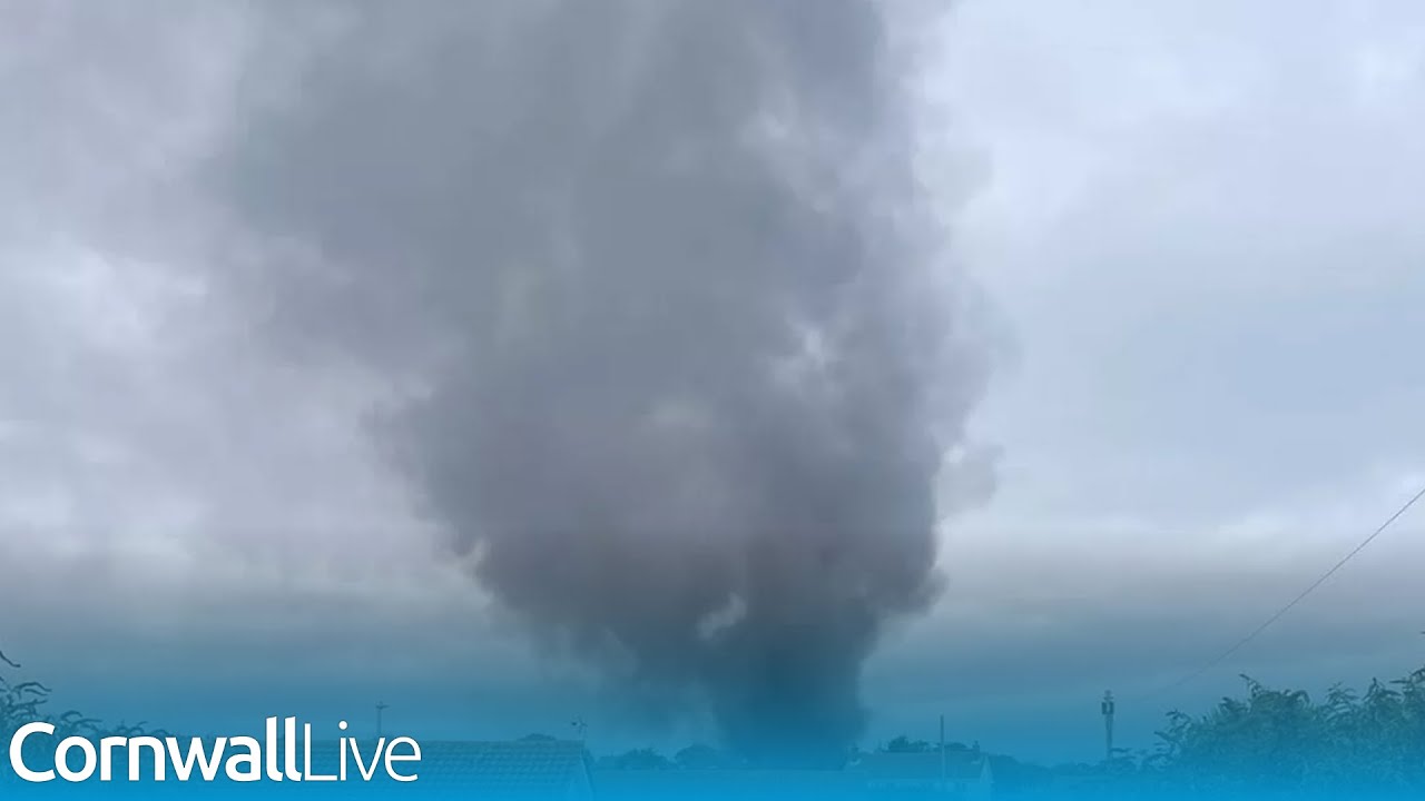 Barn erupts in flames as huge smoke cloud seen