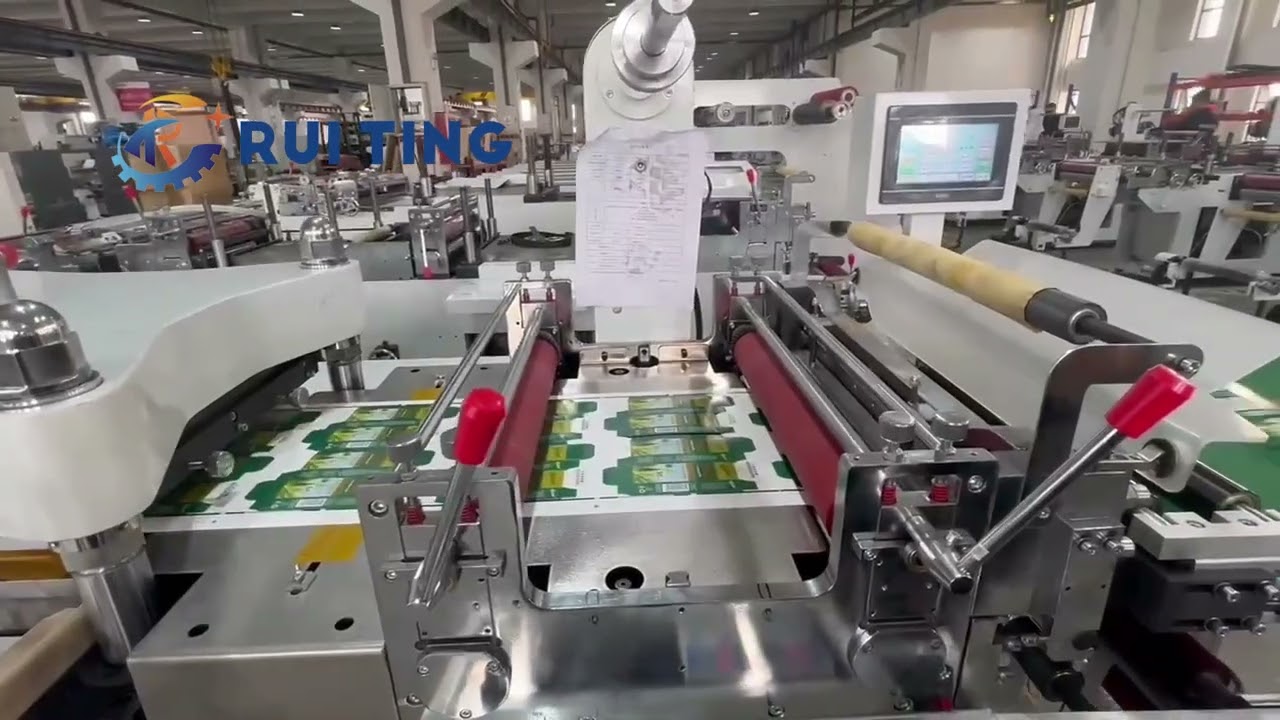 double seats flatbed die cutting machine cutting through paper box with sheet conveyor belt