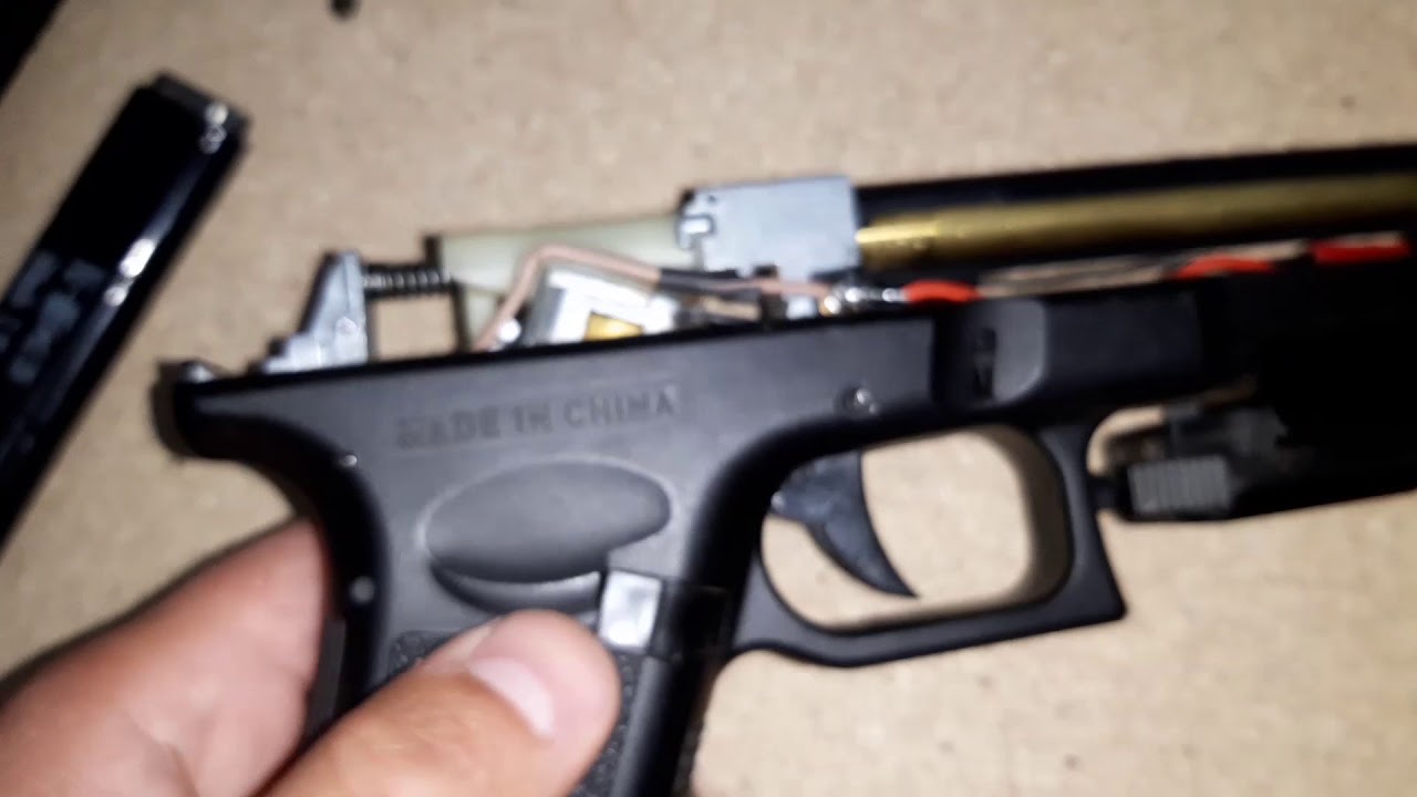 Nitro - Como Cambiar Bateria a pistola electrica de airsoft | Pistola Cyma cm030 | Glock18C