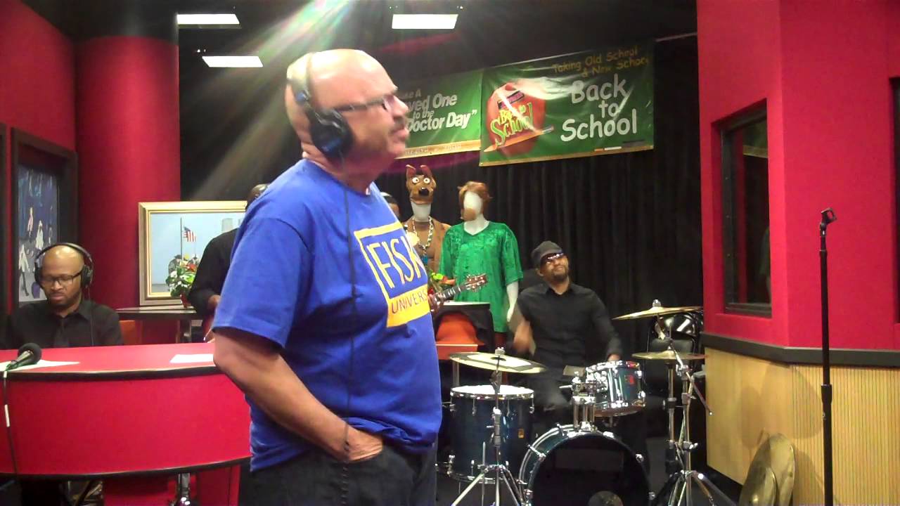 Charlie Wilson performs while visiting the Red Velvet Cake Studio