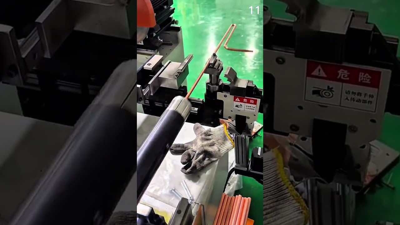 Bending copper rod with rotating clamp and gloved hand