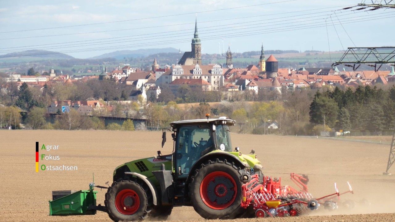 Claas Arion 660 mit Grimme Matrix 1800 am Zuckerr&uuml;ben auss&auml;en mit atemberaubender Kulisse