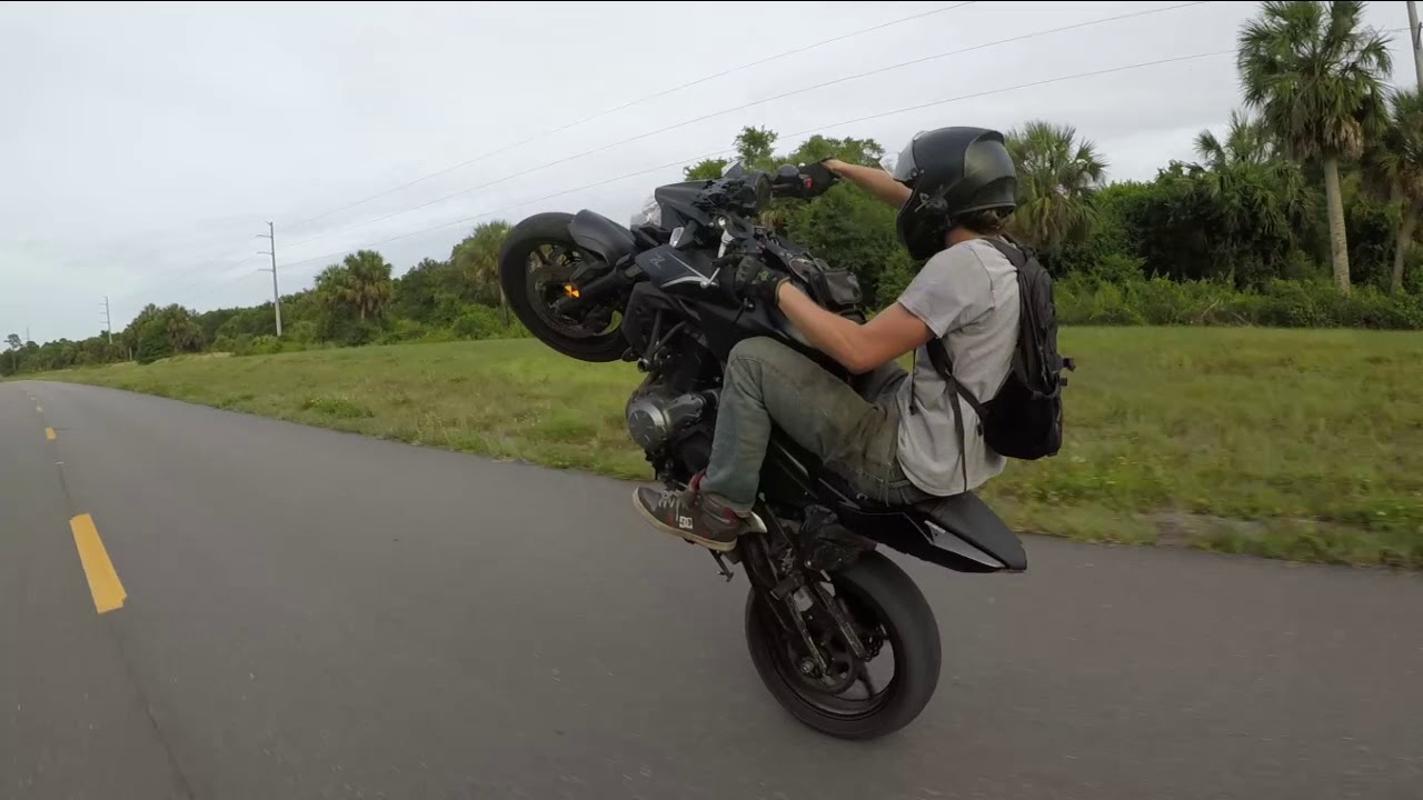 how to wheelie a z650