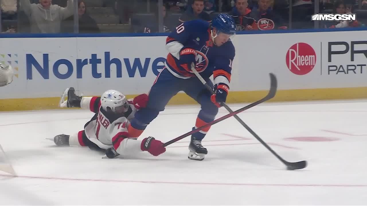 Simon Holmstrom scores a goal against the New Jersey Devils