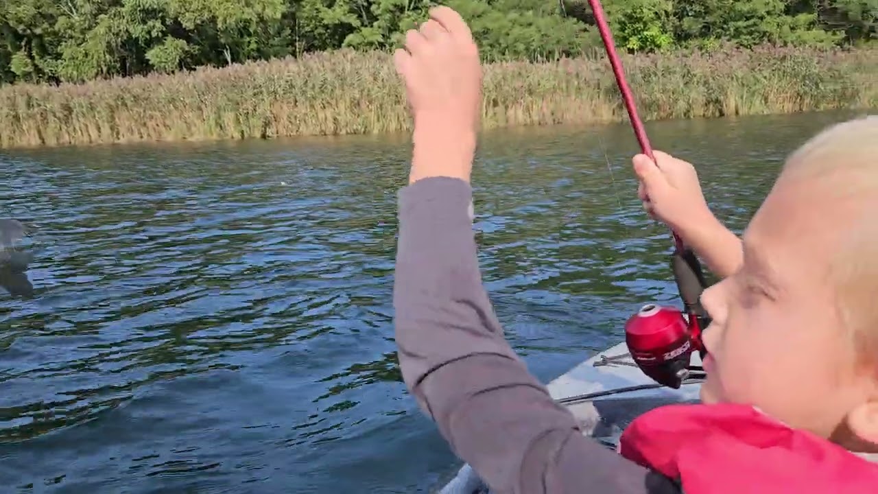 Henry and Jesse on kayak fishing for first time
