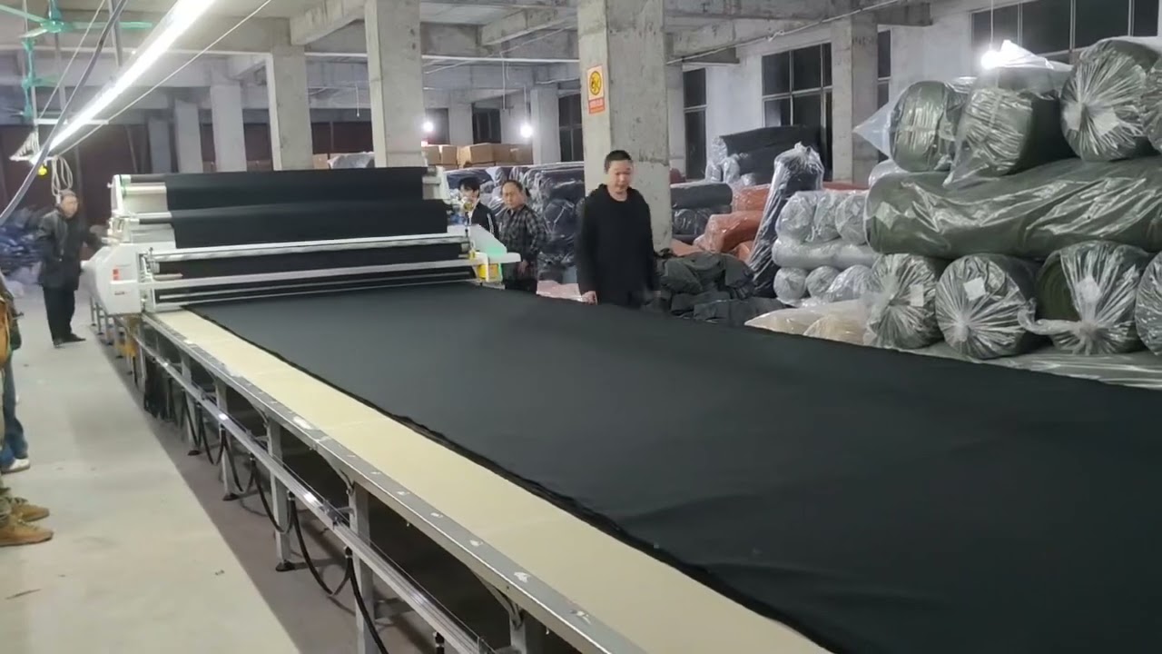 Auto fabric spreading/laying machine#autocutter #autospreader 