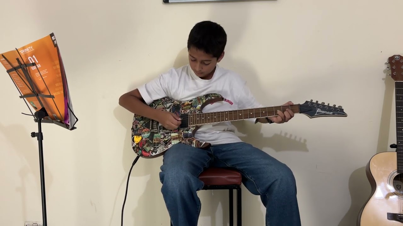 Praneel Grade1Guitar Rock and Pop Trinity