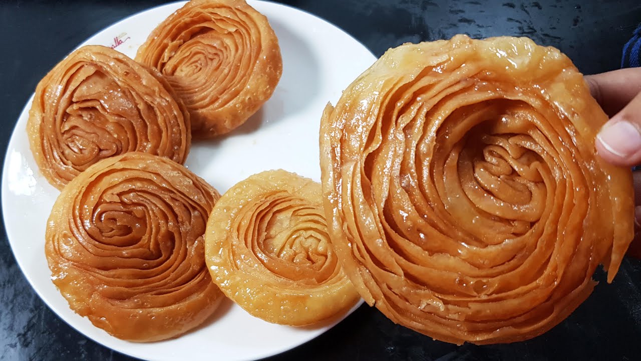Easy Crispy Poori Sweet in Telugu - కరకరలాడే తీయని పూరీలు - Sweet Poori