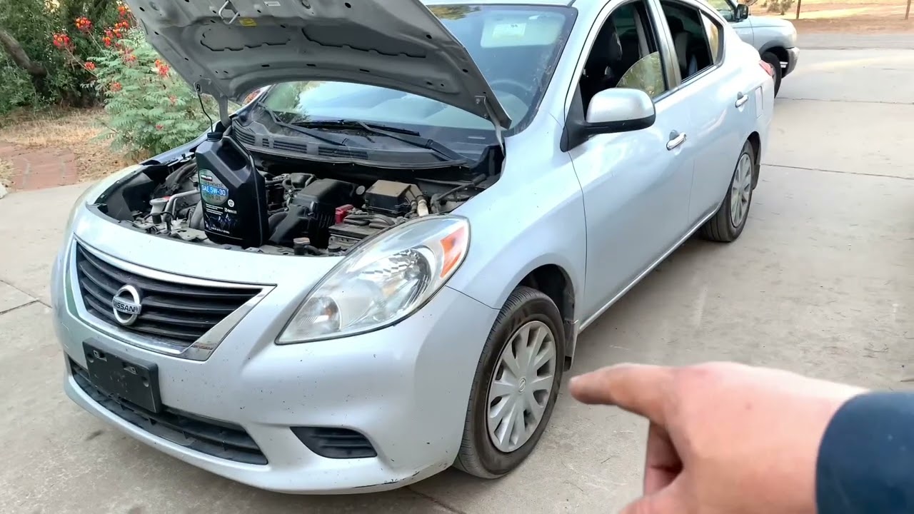 Oil change on a Nissan Versa easy and cheap @elchanojose