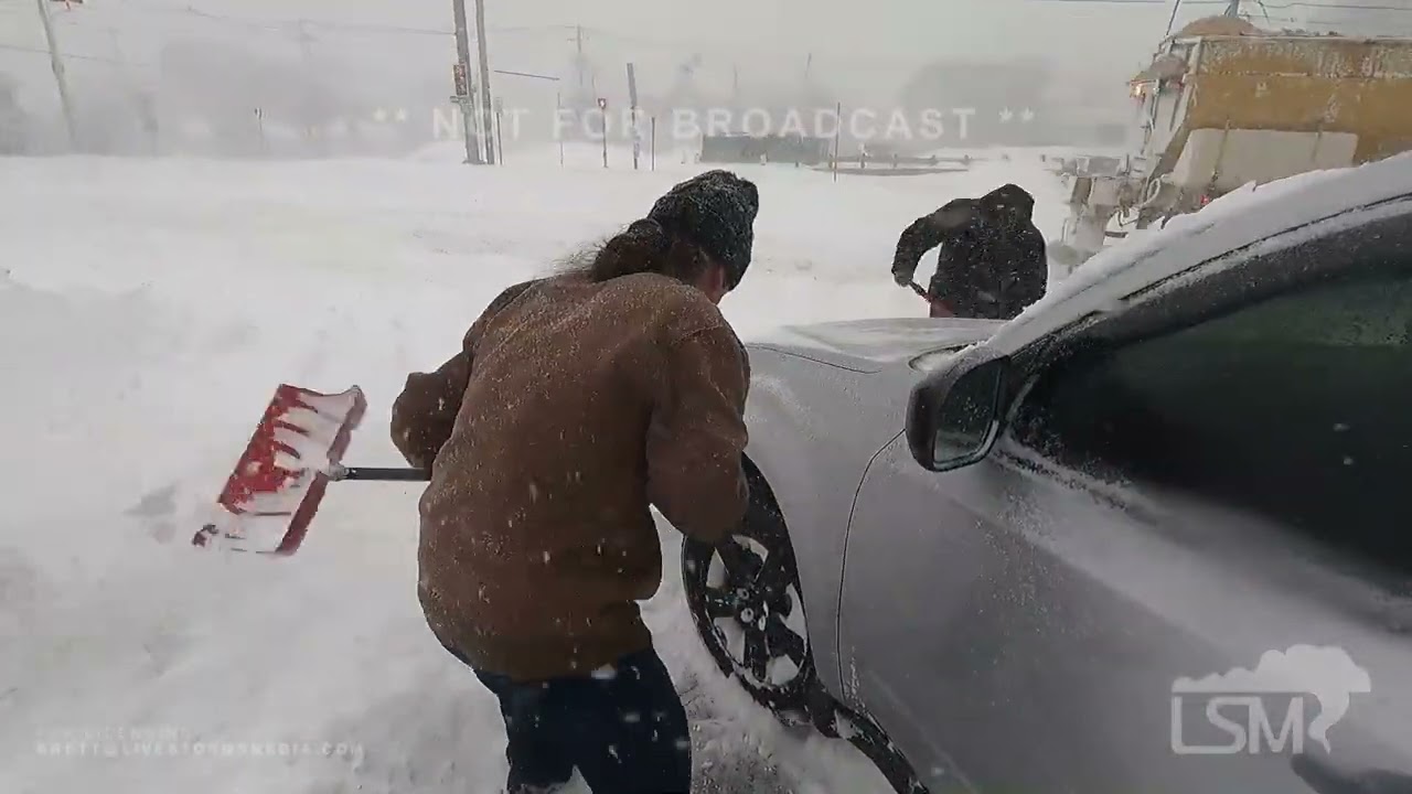 01-29-2022 Boston, MA - Downtown snowed in - cars stuck on I-93,  Interview with Stuck Driver (SOT)