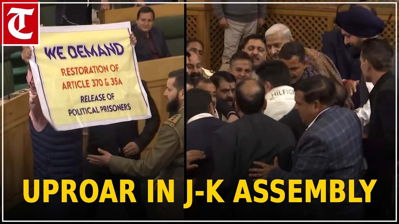 Uproar in J-K Assembly as Engineer Rashid's brother displays Art 370 banner