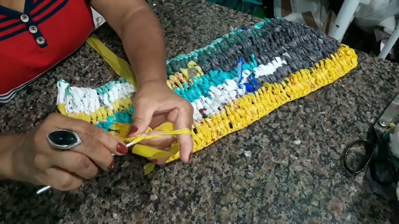 Tapete com sacola de plástico