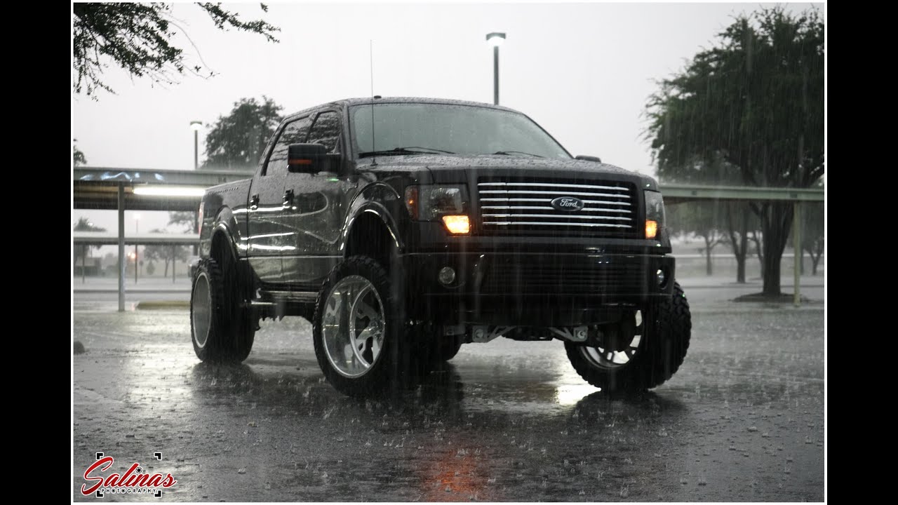 Big lifted AWD F150 on the widest tires in the market has fun in the rain after being built!