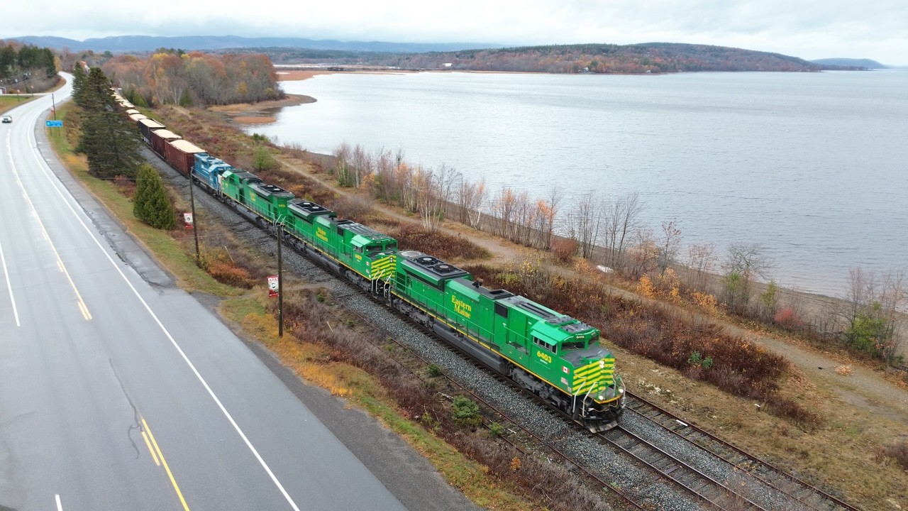Awesome Aerial 4K View! Long Freight Container Train NBSR 120 passing Westfield Beach, NB