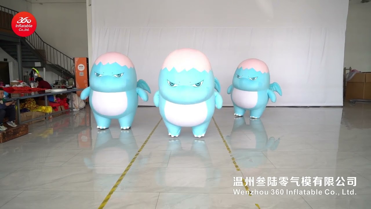 Three blue cartoon dragons