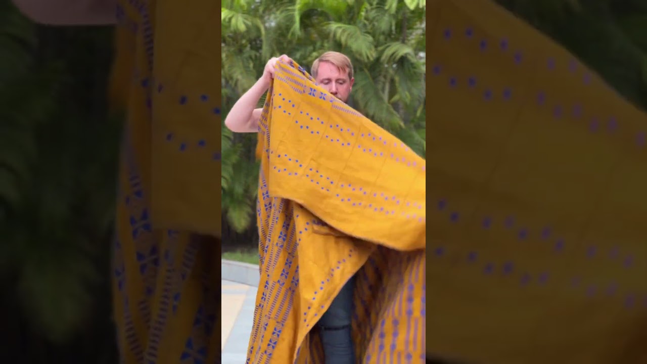 White man  teaching us how to wrap men #ghanaian cloth.  #men #ghanaianmen #cloth #ghana #tradition
