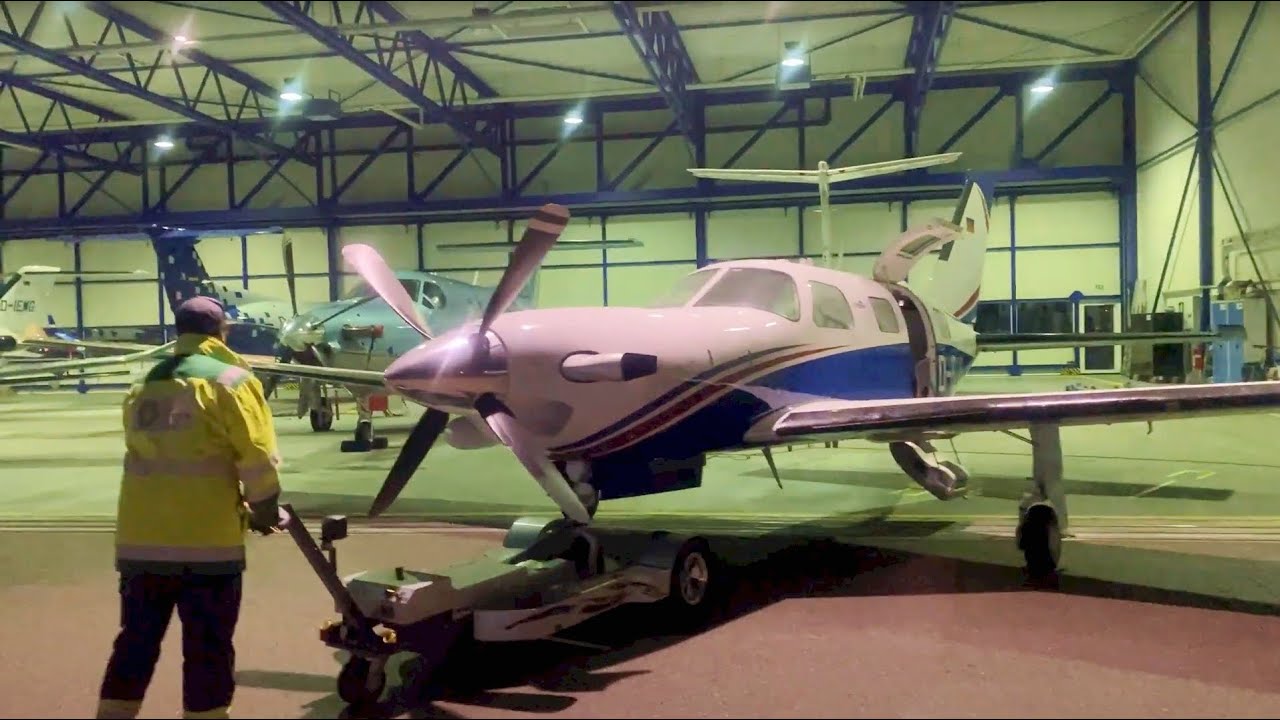 DA62 Successor, Frozen Piper Meridian pushed back to the heated hangar in Augsburg (EDMA)