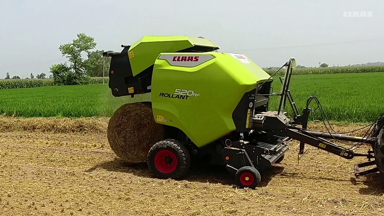 ROLLANT 520 RF  round baler - Working in Indian fields