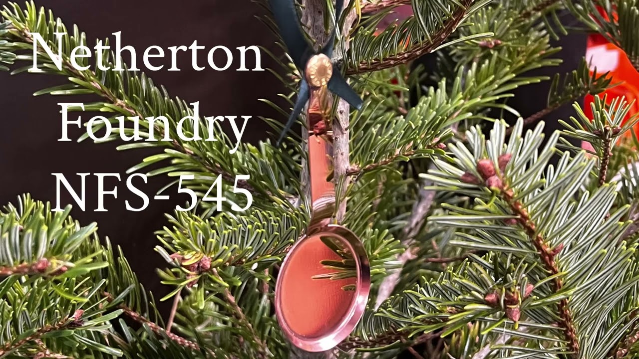Hand making a Netherton Foundry Christmas Decoration