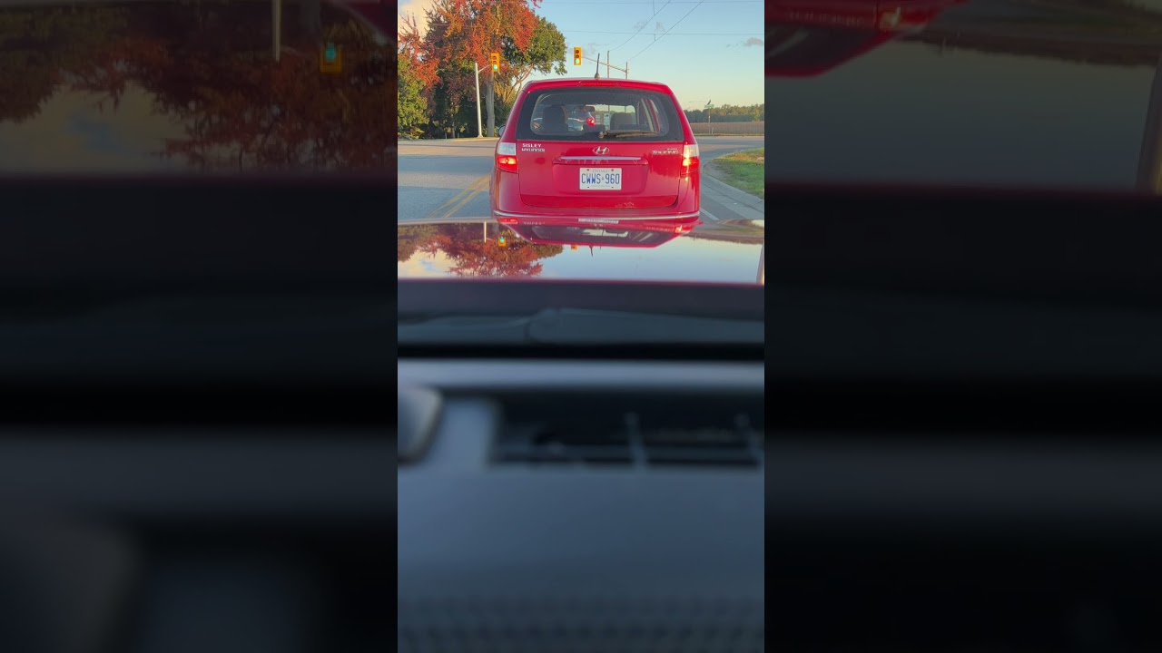 London Area Bad Drivers - driver sits at traffic light on road that is 10kph slower than destination