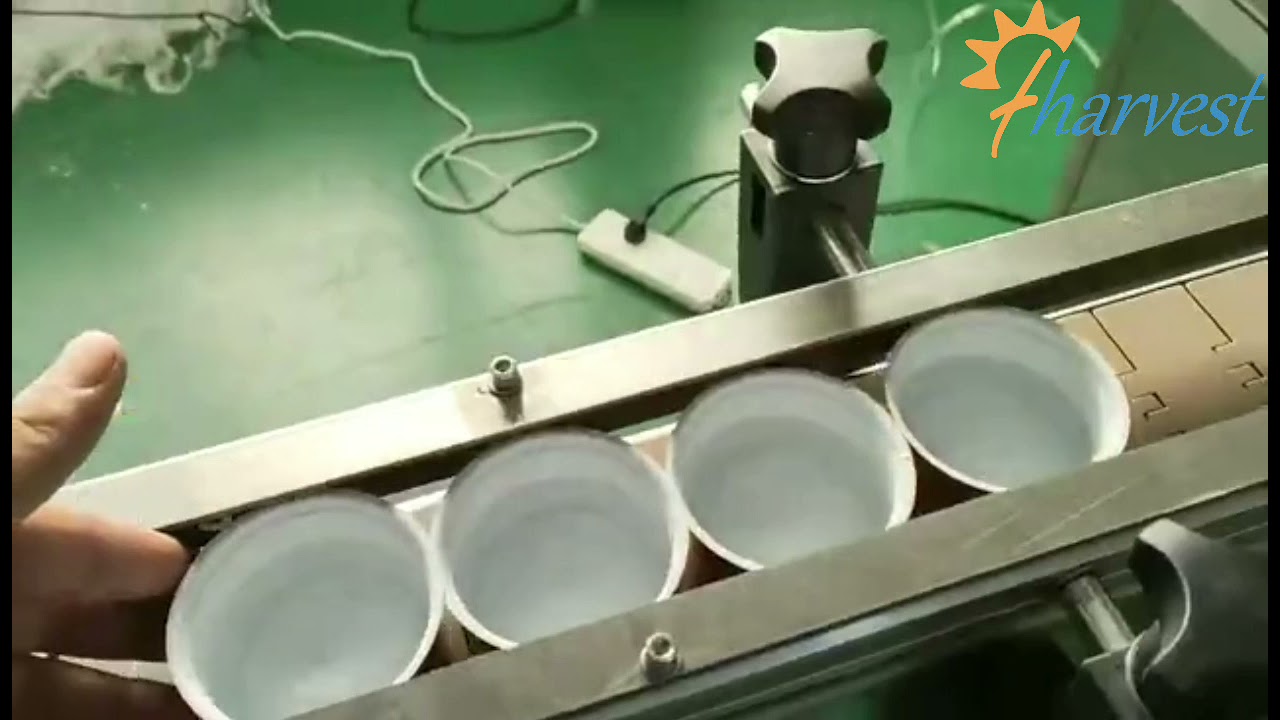 Fugleredet /  sukkerfyllingsmaskin for r&oslash;de dadler, 4-hodets v&aelig;skefyllings- og forseglingsmaskin