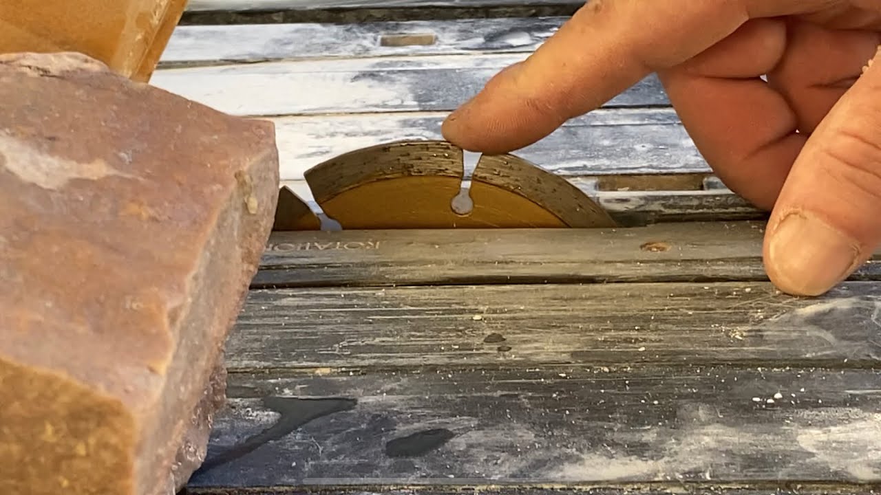 Andamooka concrete matrix opal: cutting large stones on a 4 inch saw.