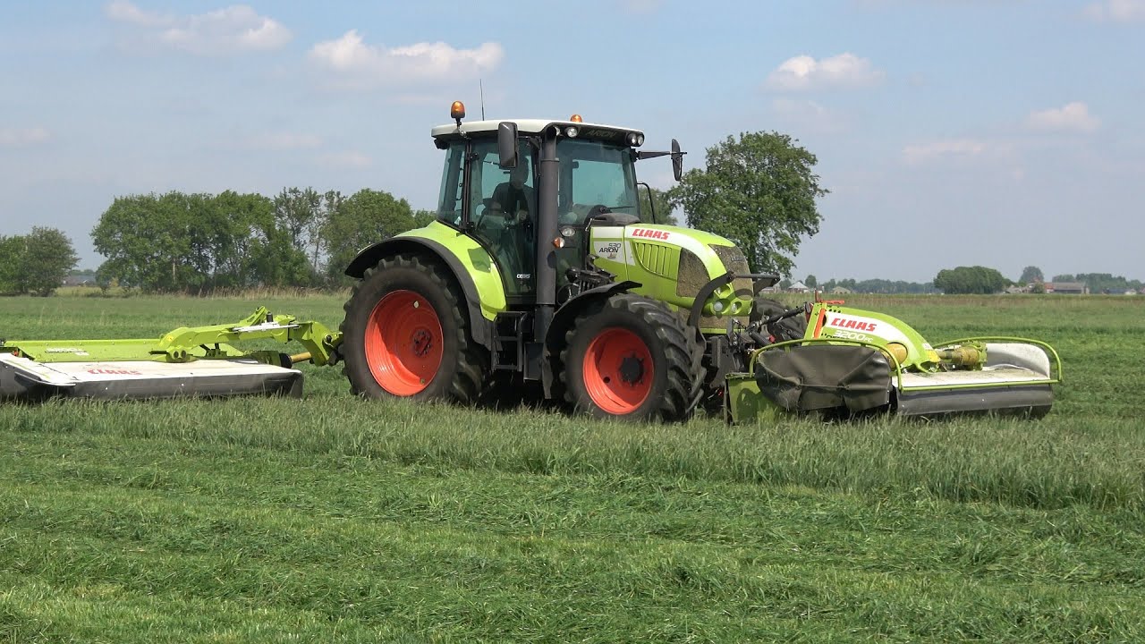 Gras maaien/schudden - Claas Arion 530 met Disco maaiers & John Deere 2850 met Lely Lotus (2020)