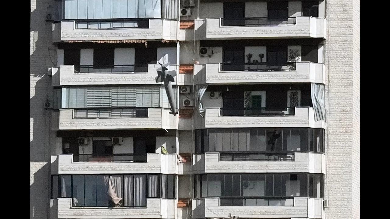 Photos capture moment bomb launched from an Israeli jet hits a building in Beirut