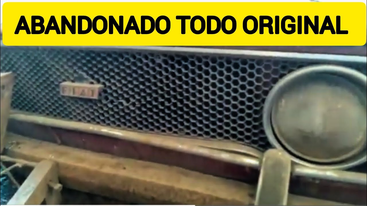 Fiat 128 abandonado en un galpón