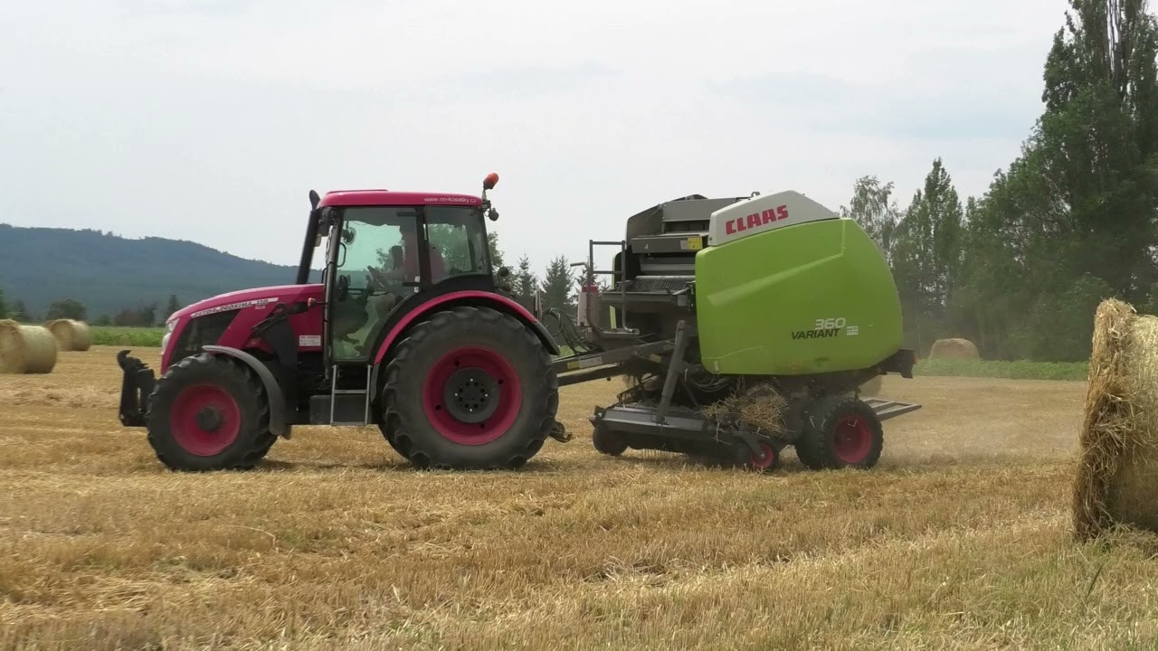 RONDE BALEN PERSEN MET EEN ZETOR PROXIMA110 PLUS EN EEN CLAAS VARIANT 360 RONDE BALENPERS
