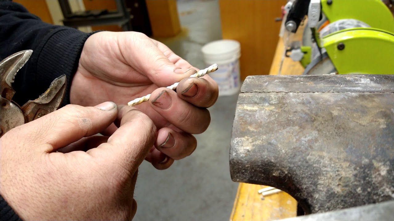 Mokume Gane build day 4 twisting three 18k and sterling rods for pattern weld