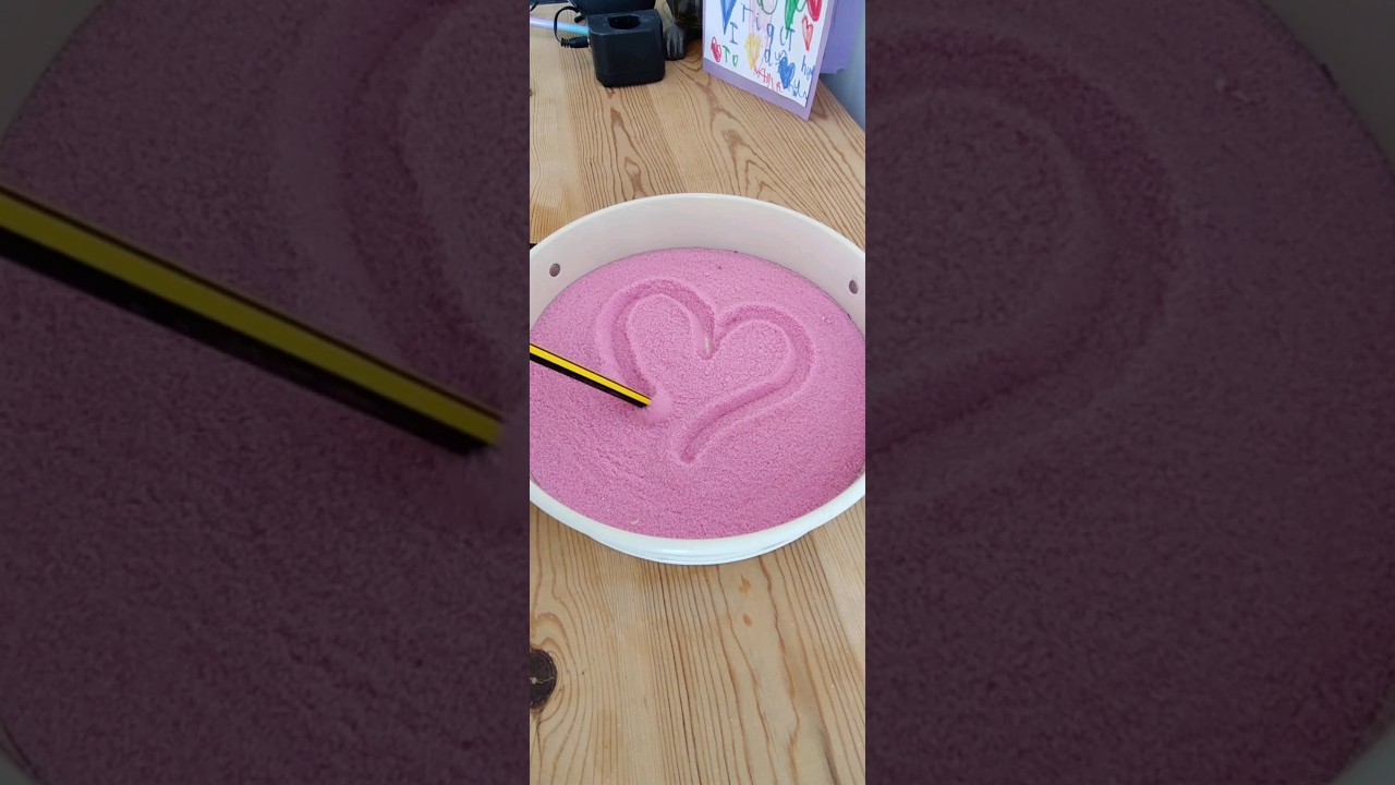Using dyed salt as a sensory play activity for preschoolers is a great way to introduce mark making.