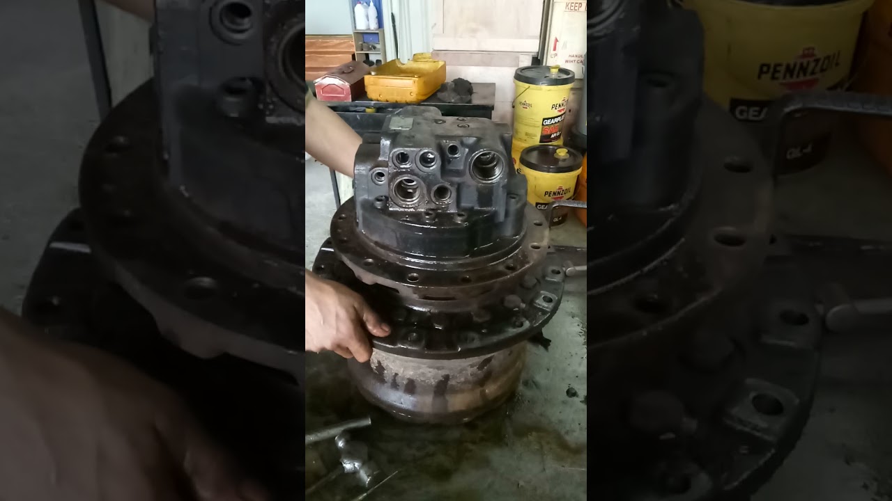 bongkar pasang komponen Travel moto gearbox excapator EX120-2 part 1