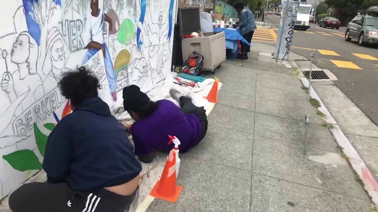 Mural on Ashby Avenue by Edythe Boone and her team. America reframed by art